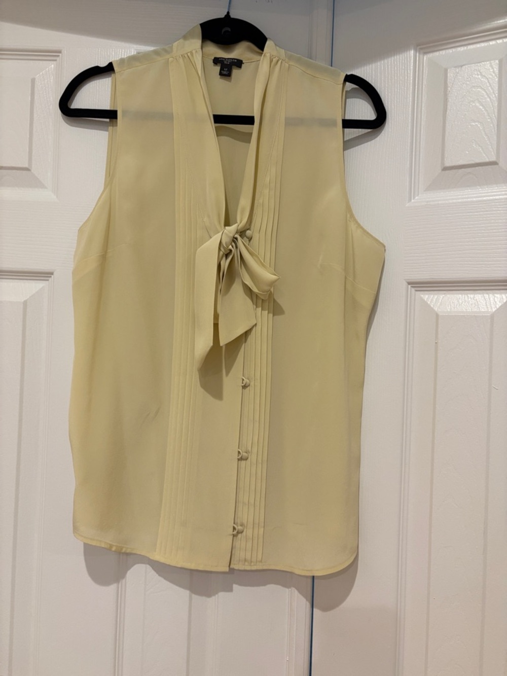 Ann Taylor Sleeveless Tie-Neck Blouse in Pale Yellow